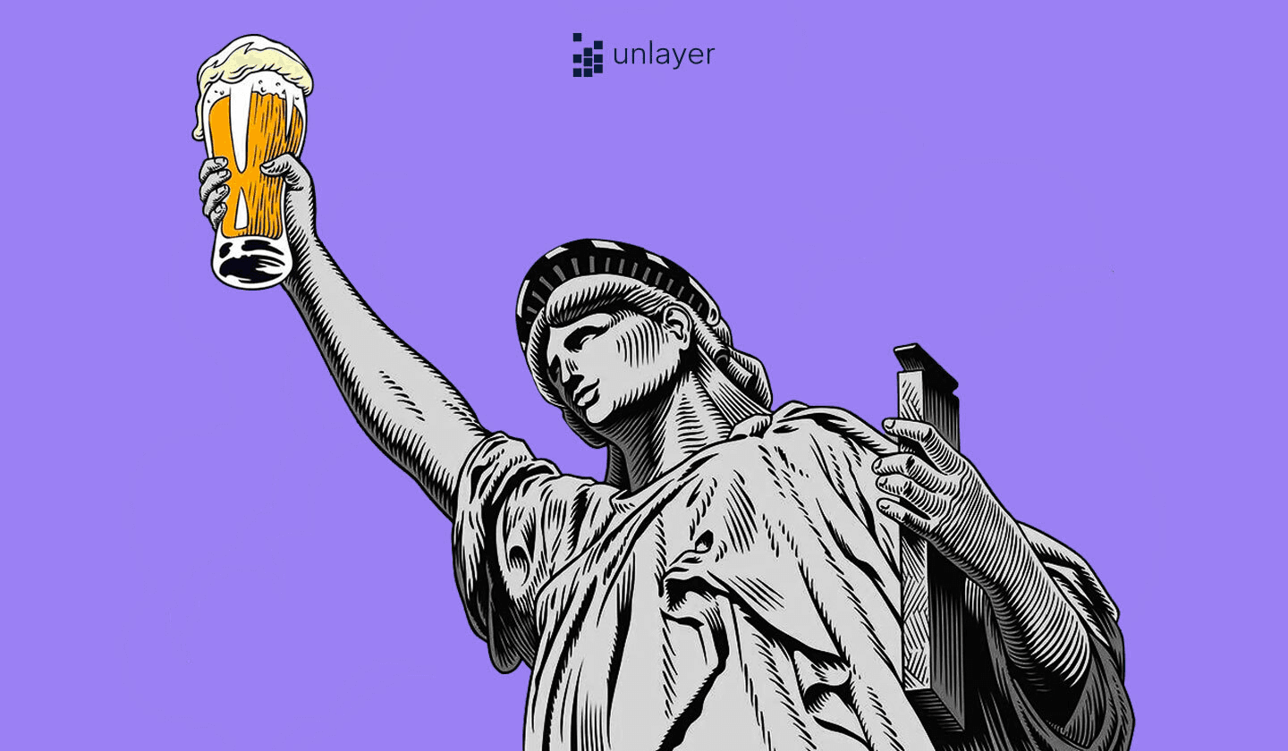 Lady Liberty holding an ice-cold beer in her hand.